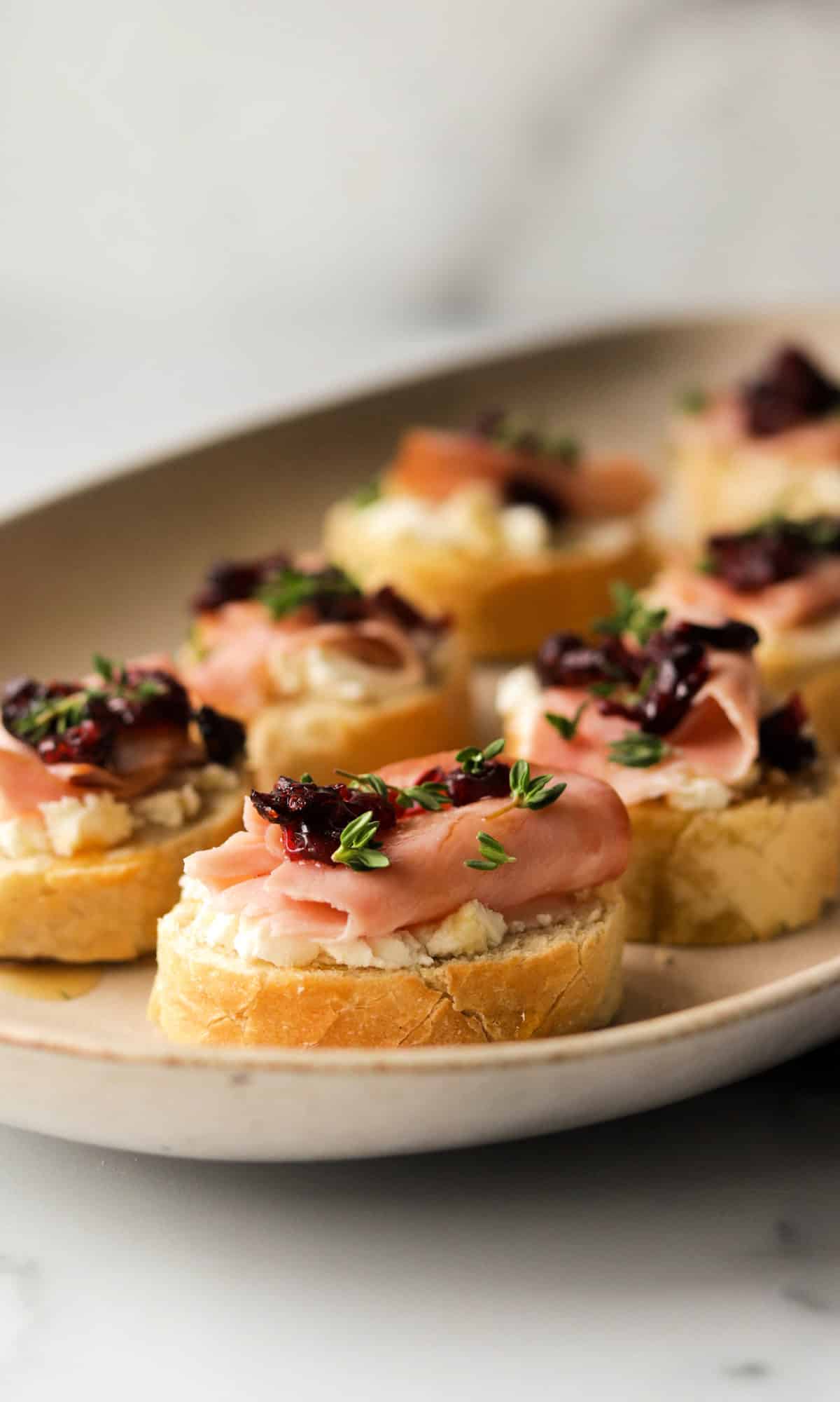 A front shot of goat cheese crostinis.