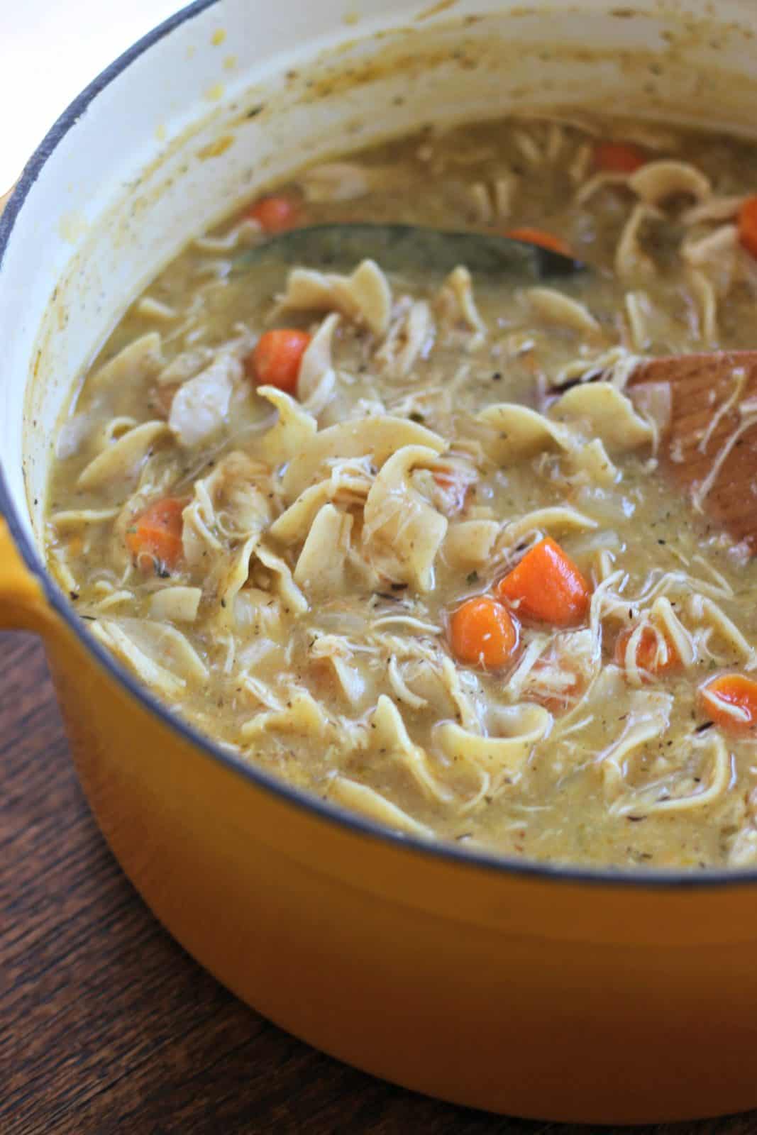 Creamy chicken noodle soup in a pot