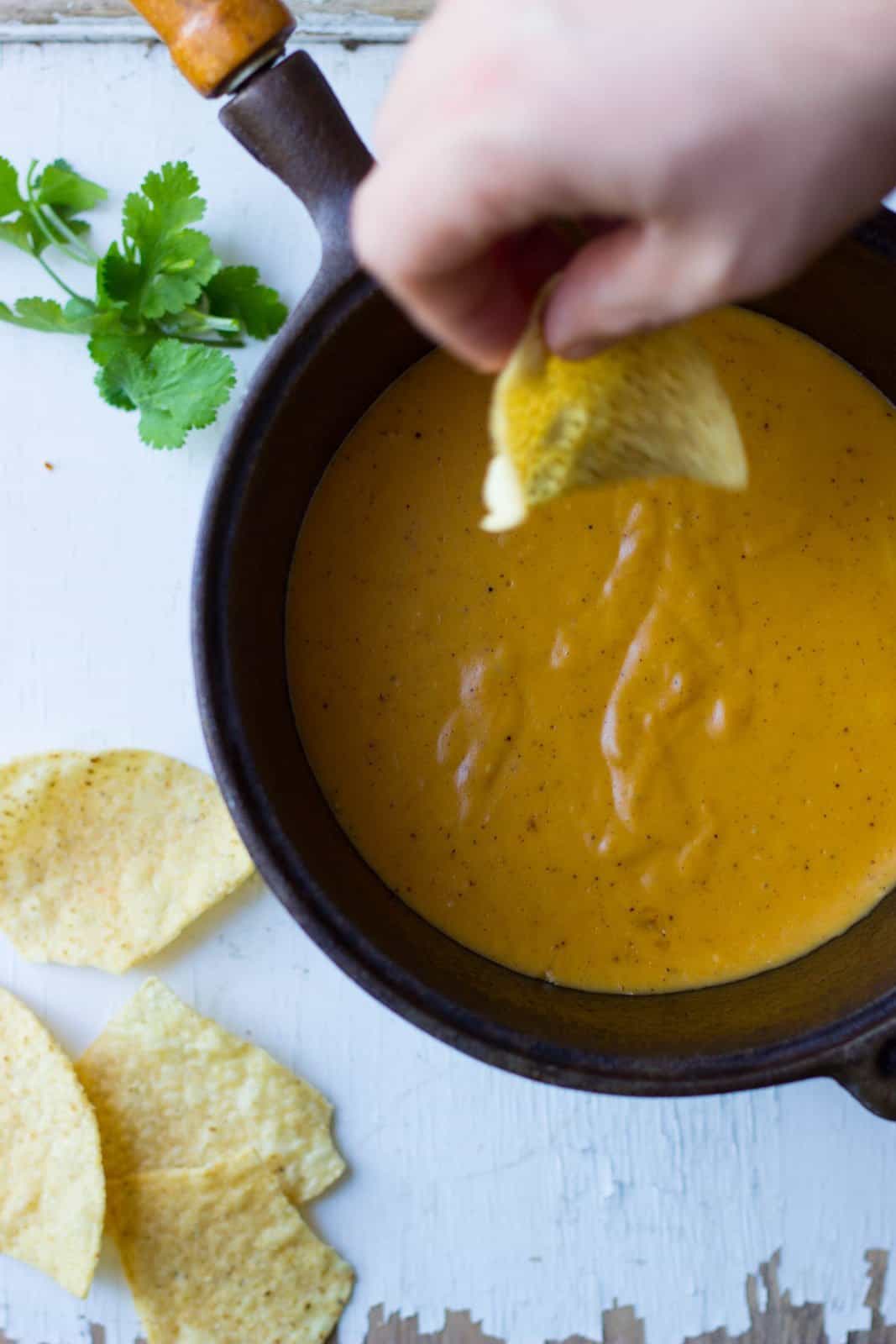 Three-cheese sweet potato queso in a pot