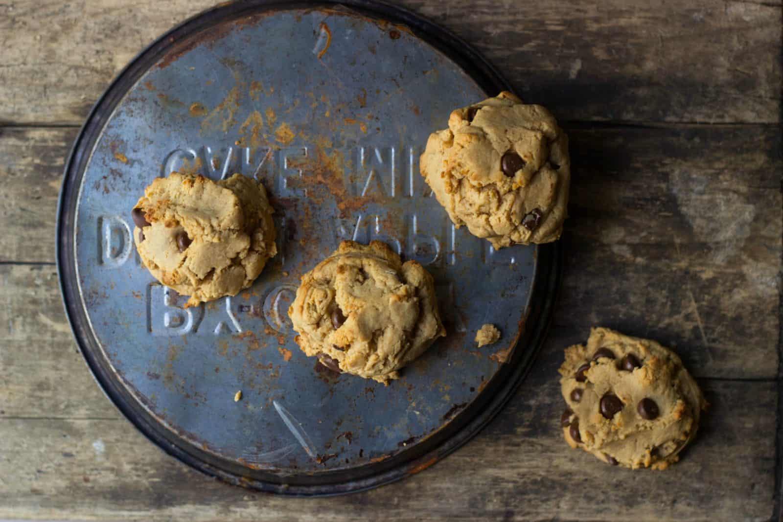 Peanut butter chocolate chip cookies on a tin