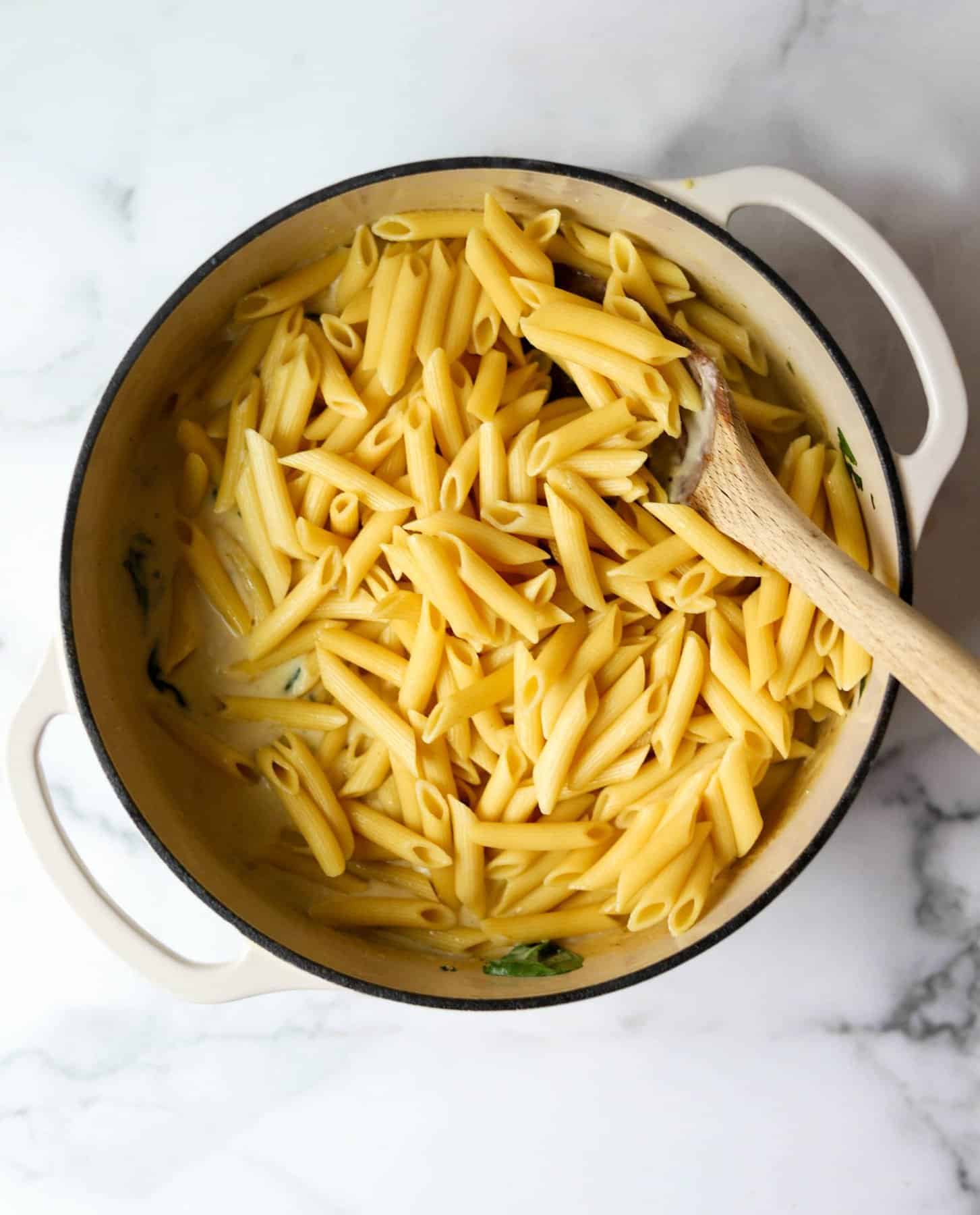 Chicken parmesan pasta in white pot