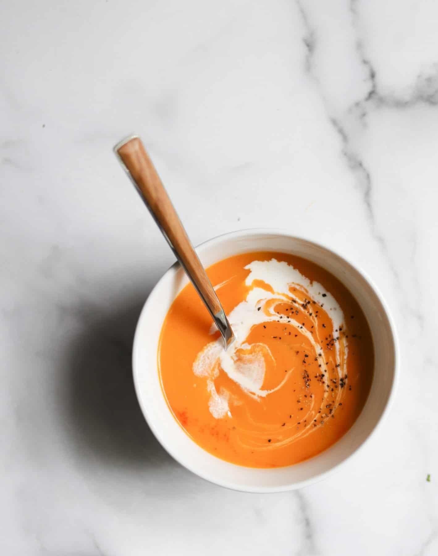 Sweet potato soup in a white bowl