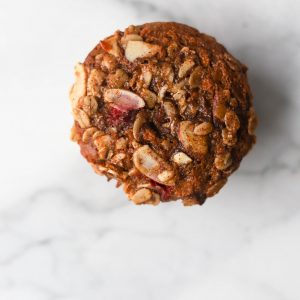 Ginger almond muffin on a marble background