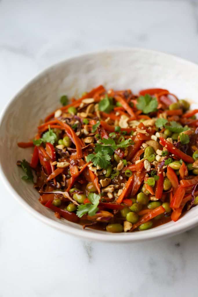 Thai vegetable salad in a white bowl