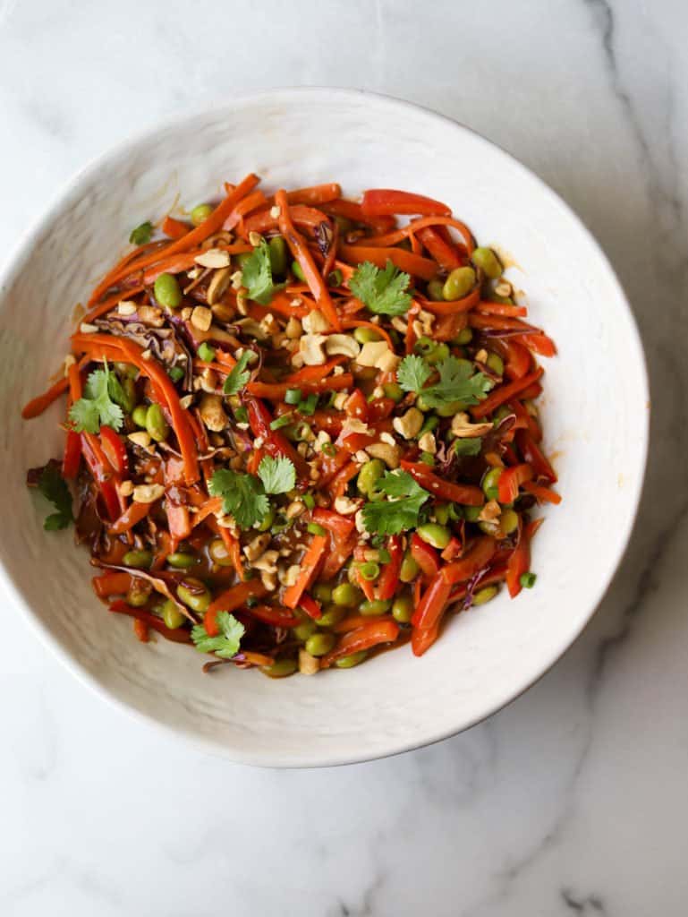 Thai vegetable salad in a white bowl