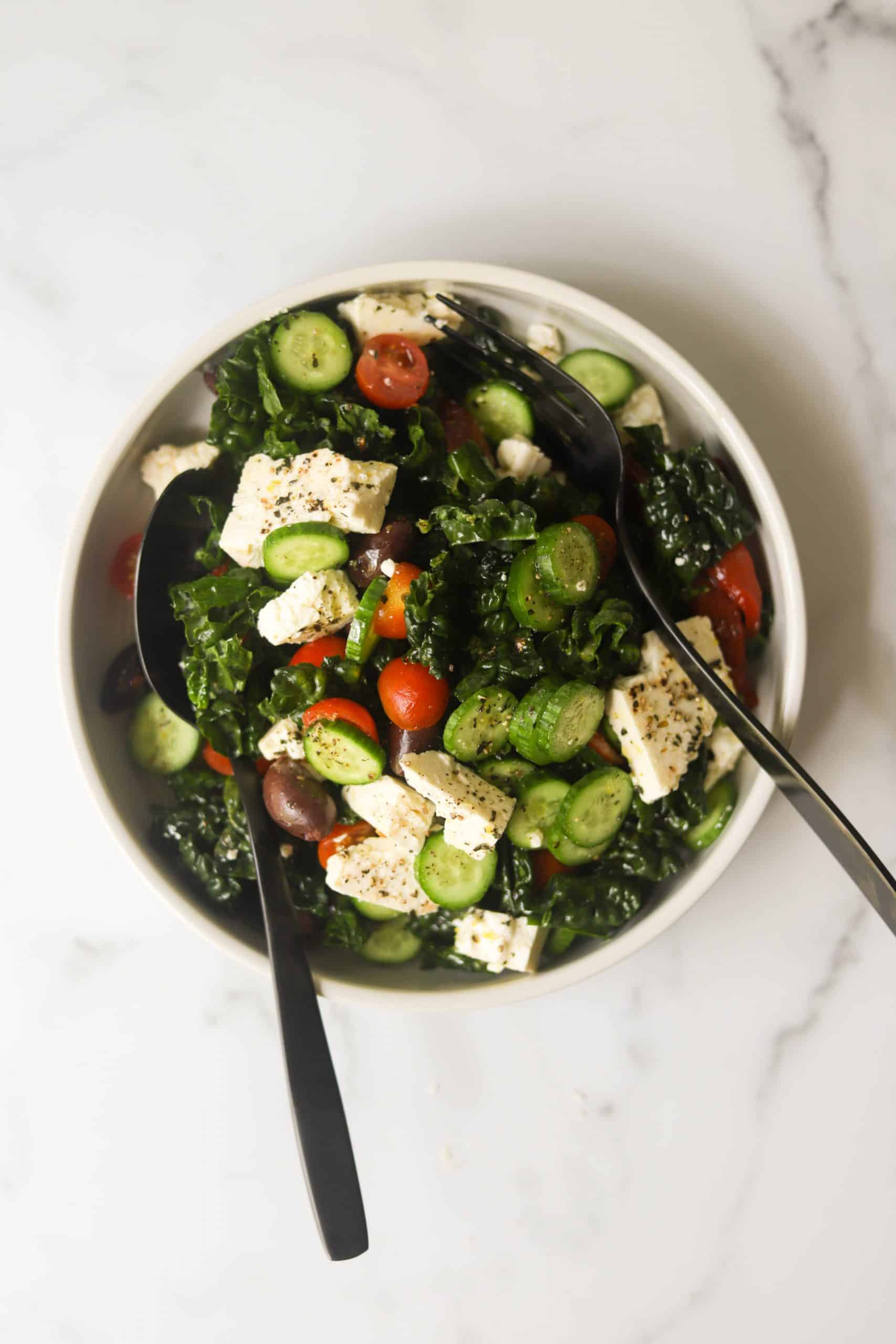 An overhead shot of a simple kale salad.