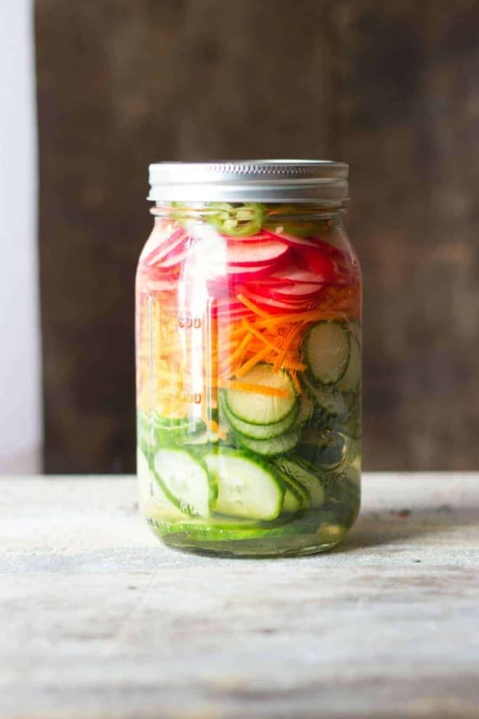 Pickled vegetables in a clear jar
