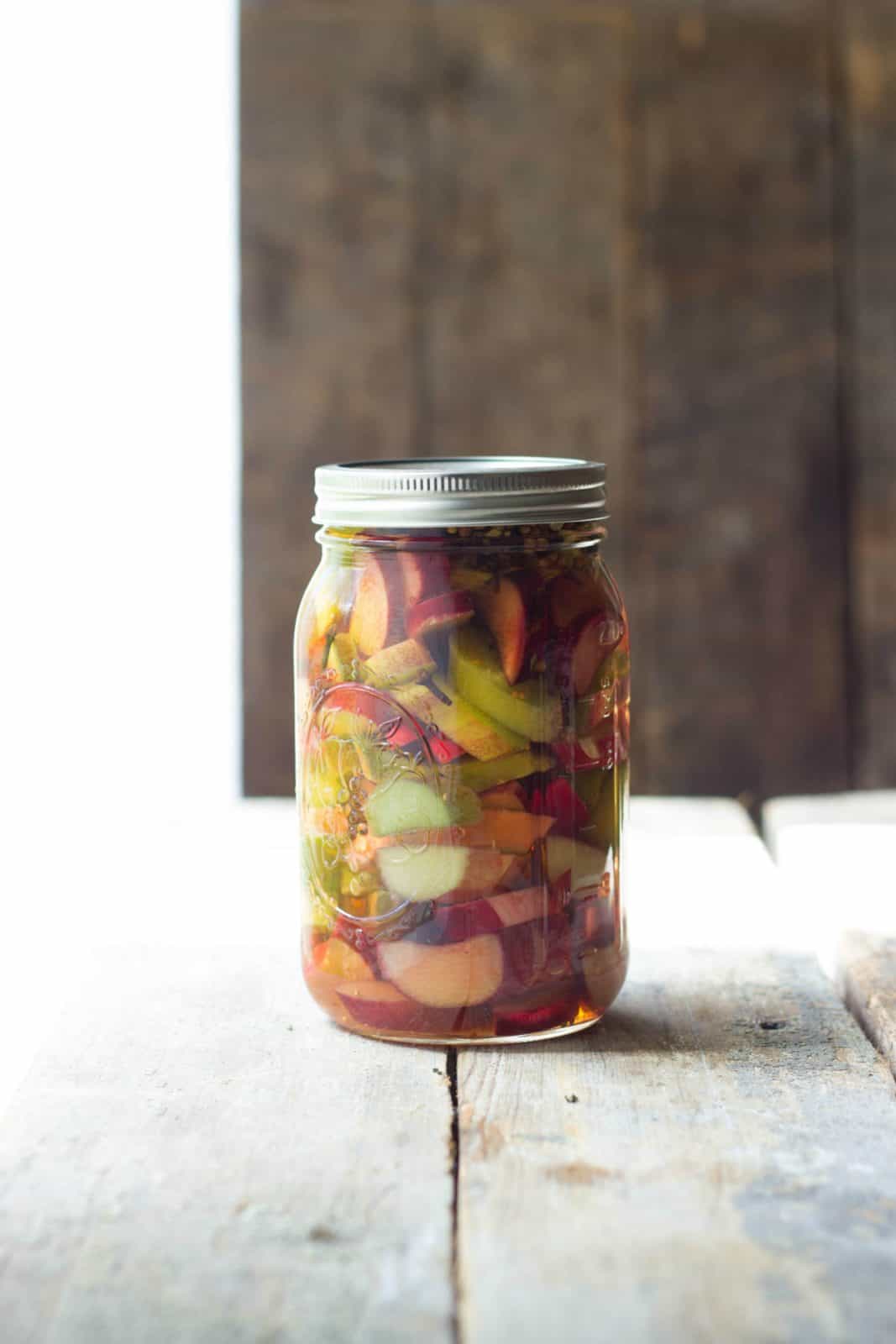 Sweet pickled rhubarb in a clear jar.