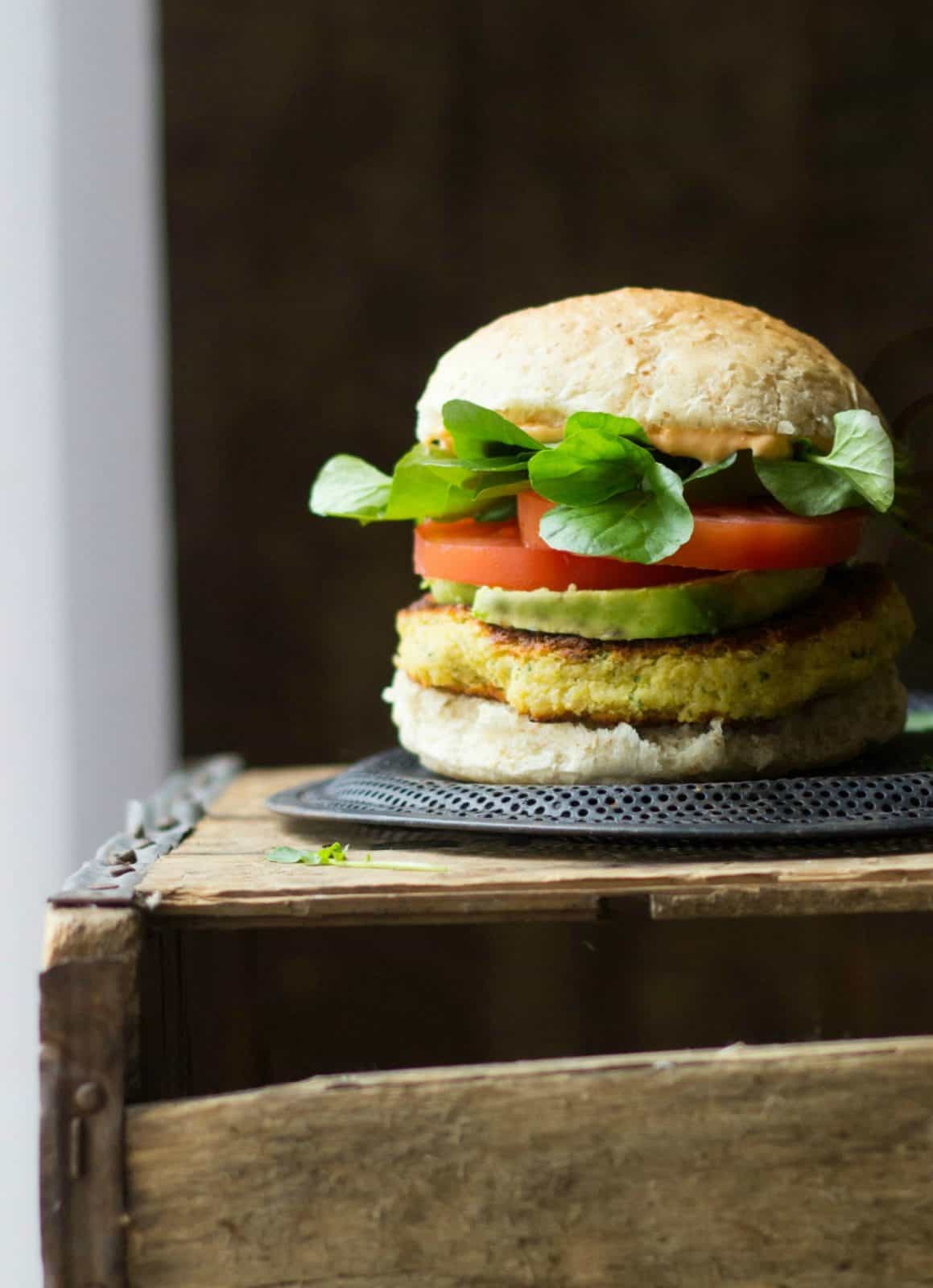 Veggie burgers on a crate.