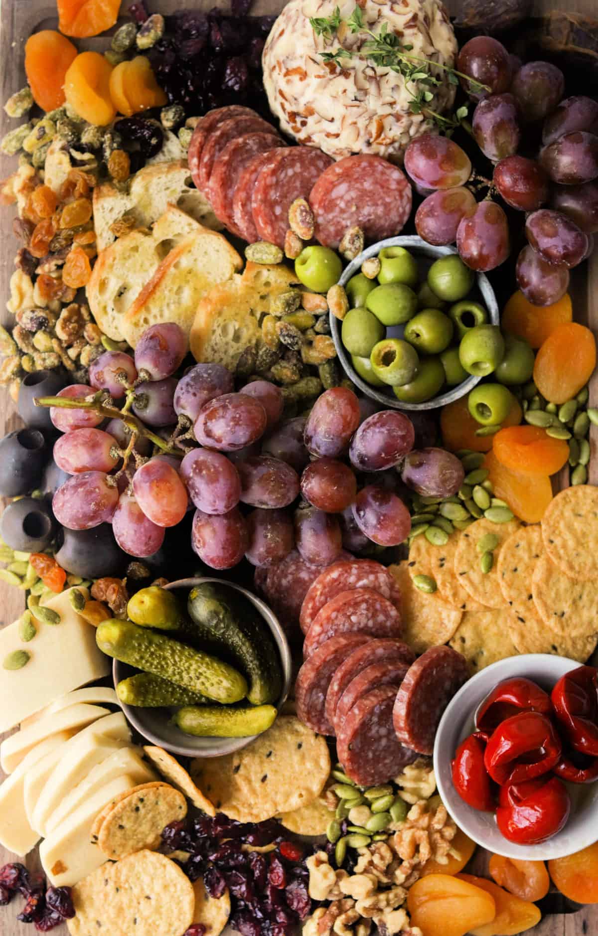 A close up overhead shot of a charcuterie board.