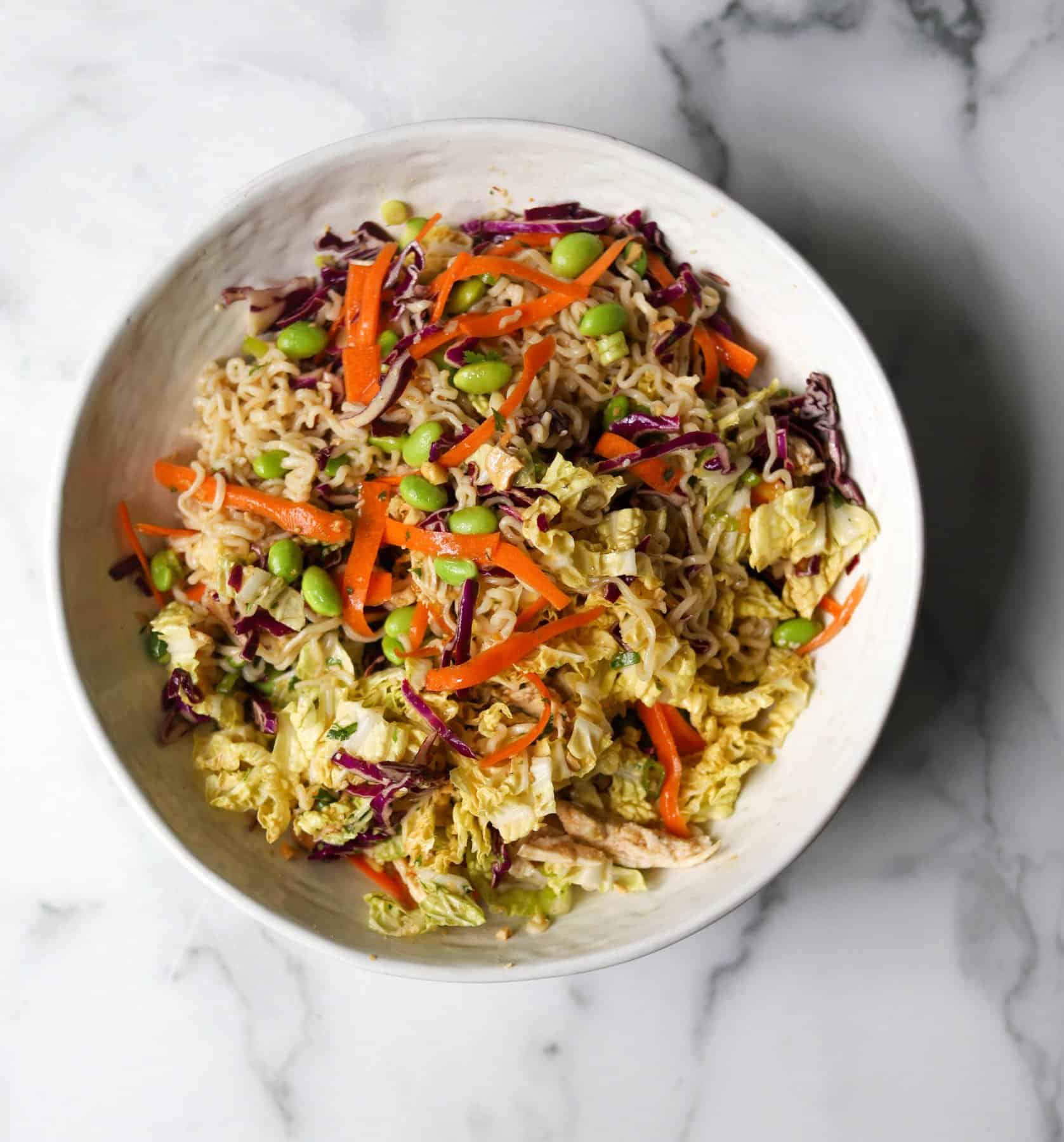 Chinese chicken salad in a white bowl