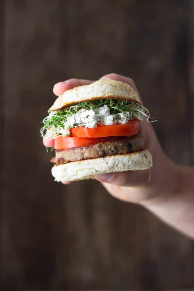 Turkey burger held up by a hand