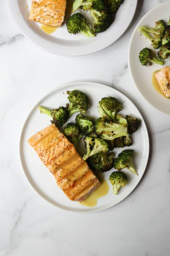 Maple salmon and broccoli on white plates
