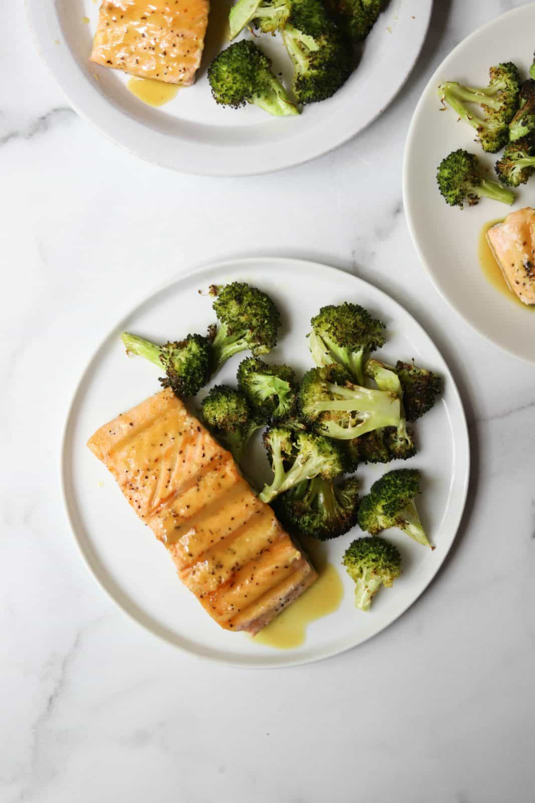 Maple salmon and broccoli on white plates