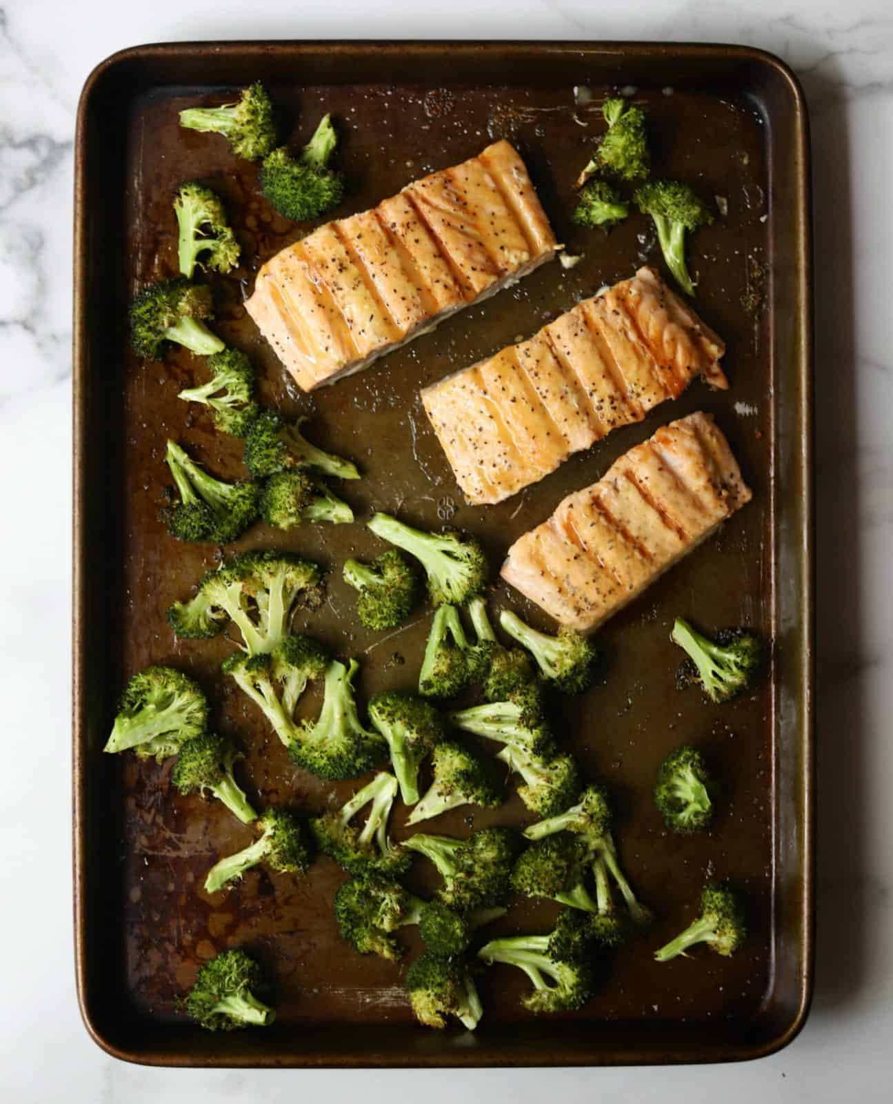 Roasted salmon and broccoli on a sheet pan