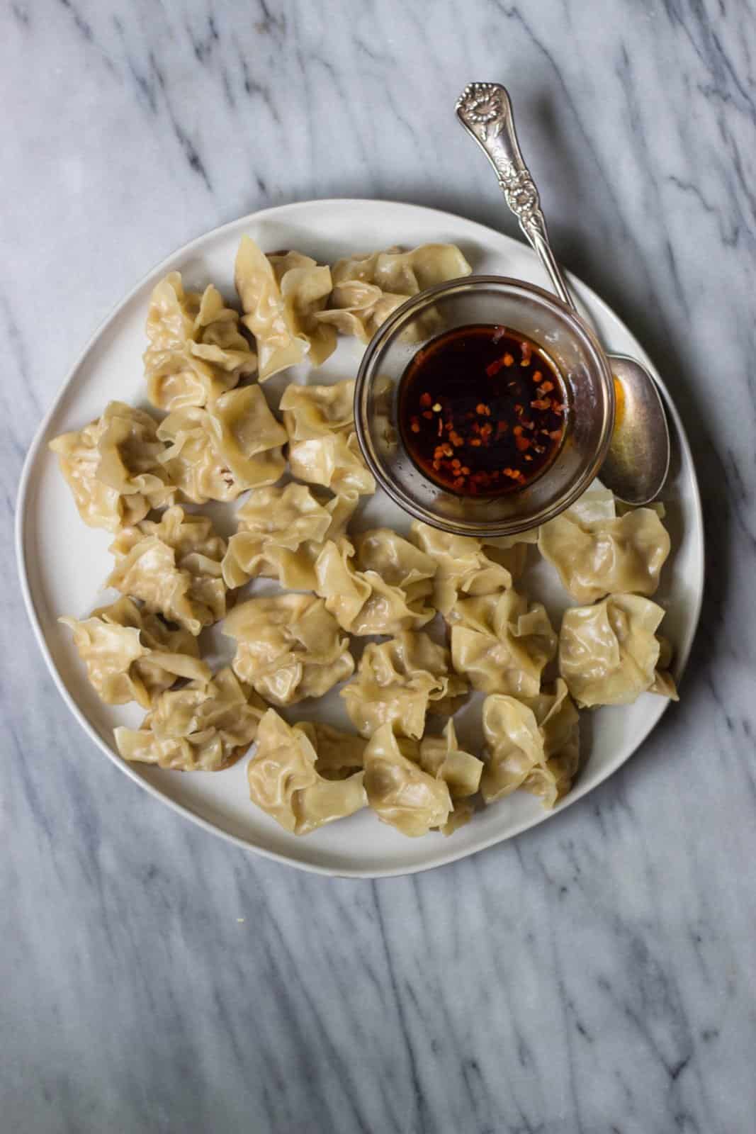 Homemade Chinese Pork Dumplings with Chili Oil Dipping Sauce