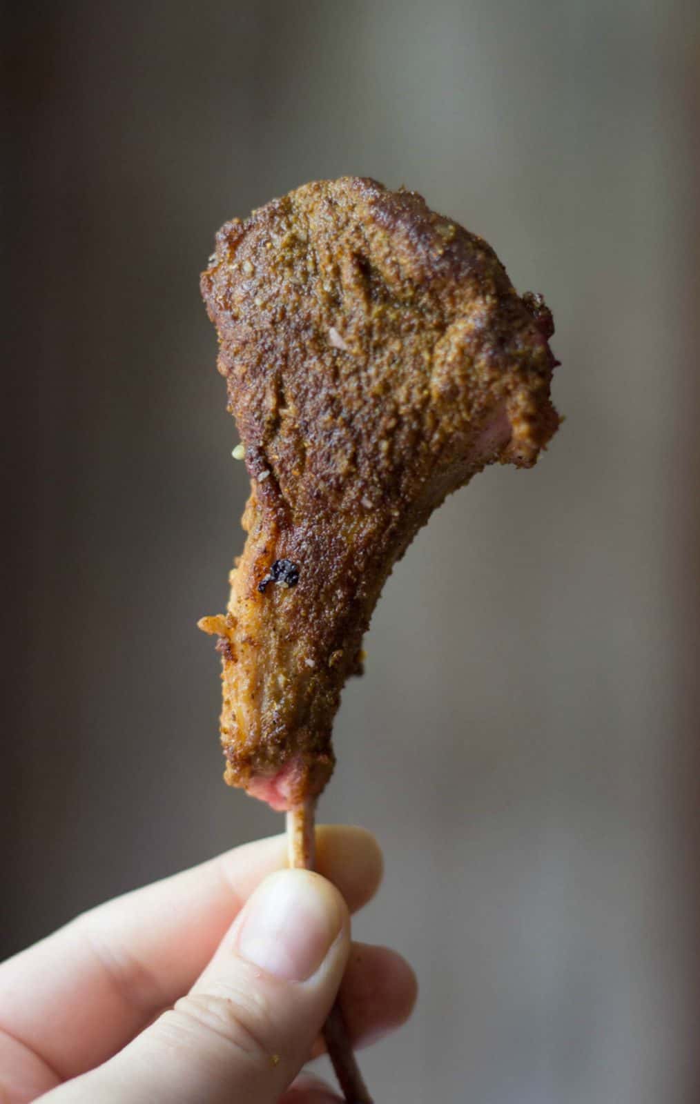 Finished close up of a Moroccan Lamb Lollipop.