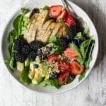 Berry Chicken Salad with Honey Balsamic Vinaigrette in a white bowl.
