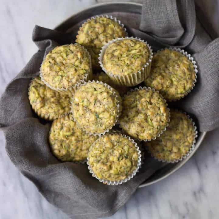 Lemon Poppy Seed Zucchini Muffins in a vintage tin.