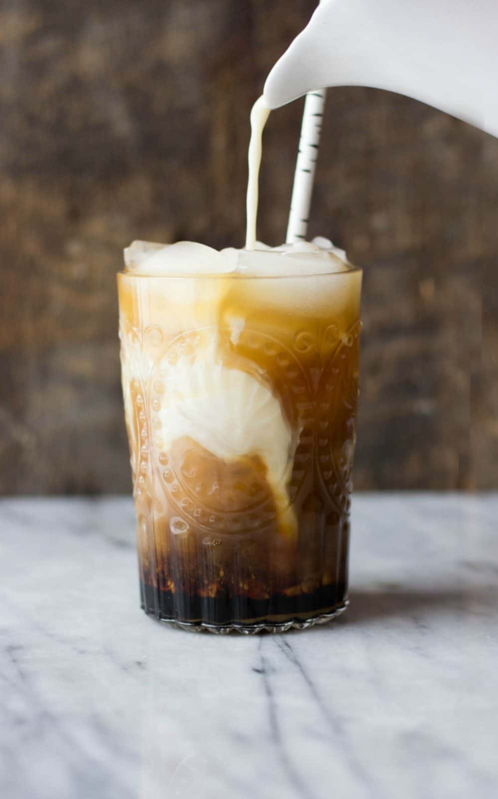 A side shot of an iced macchiato.