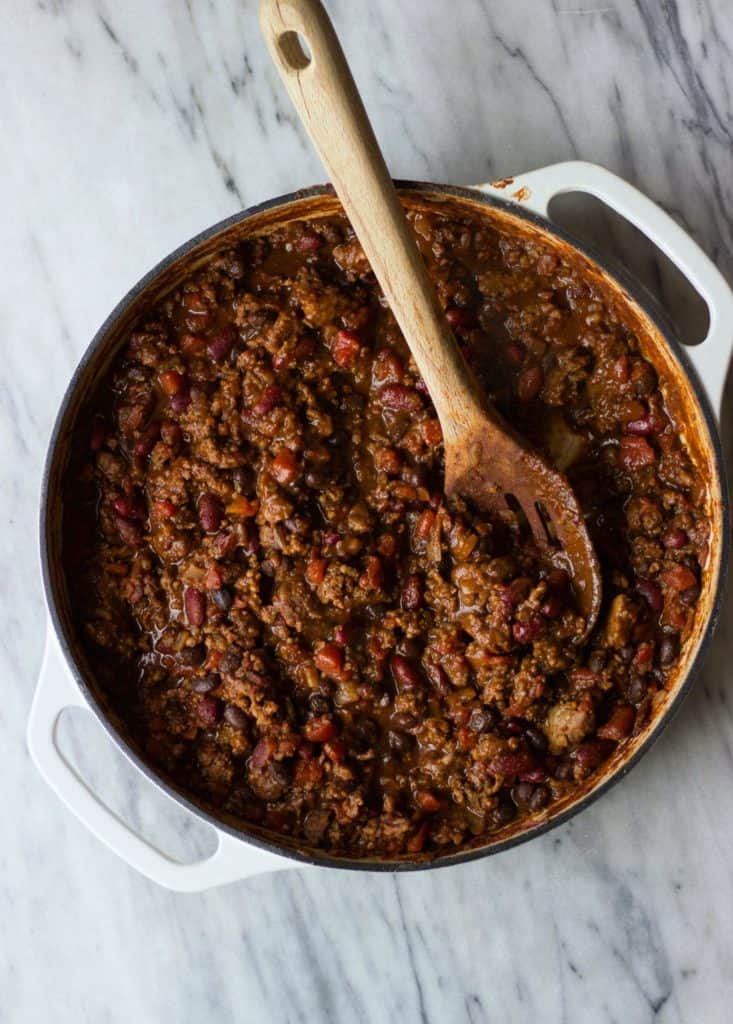 Overhead shot of chili in a white pan