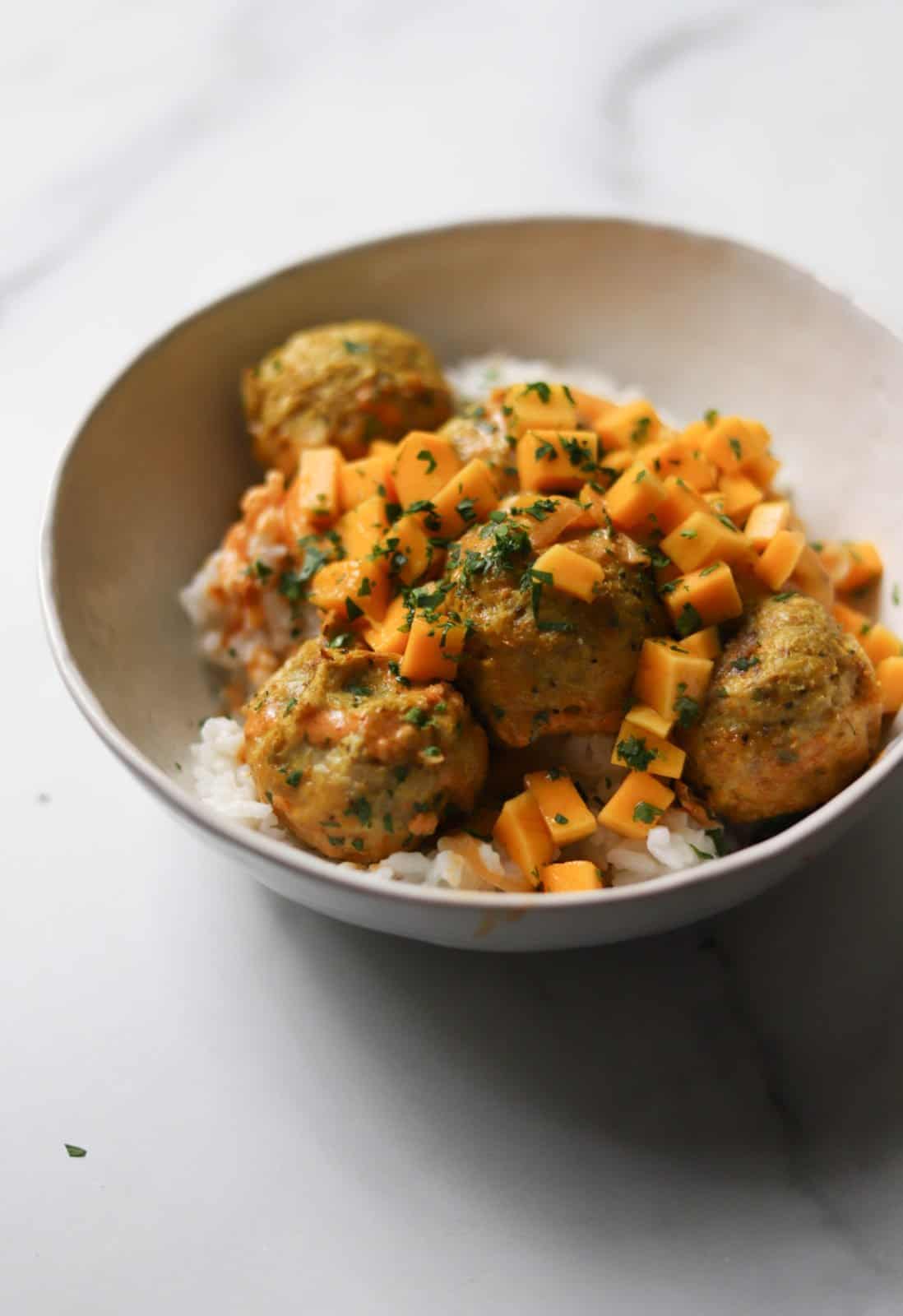 Angle shot of Curry Chicken Meatball Bowls