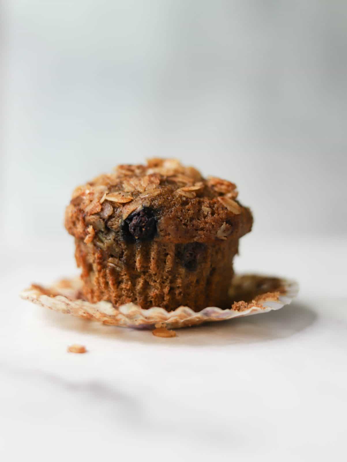 Close up shot of one Mixed Berry Crumble Muffin