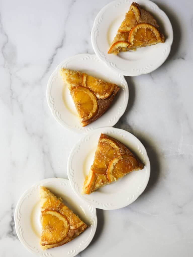 Cornmeal-ricotta cake slices on plates