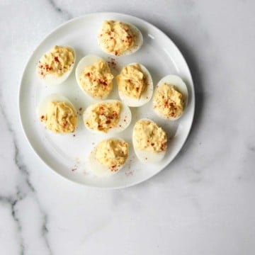 Deviled eggs on a white plate