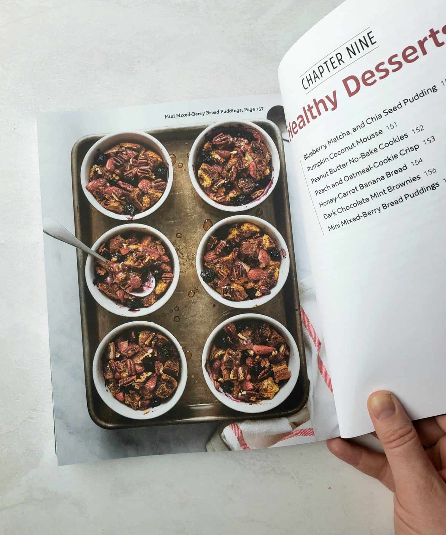 Berry bread puddings in page of cookbook