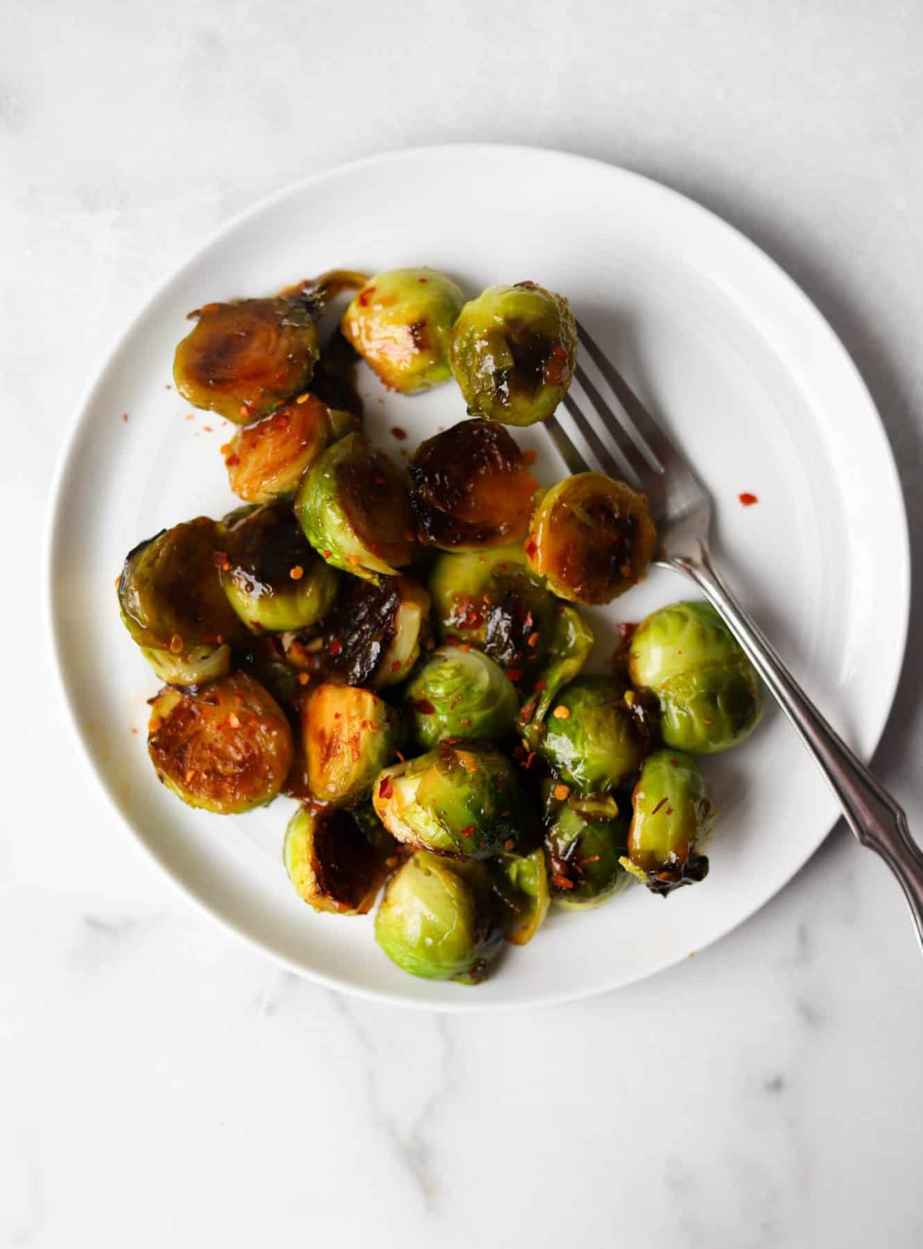 Brussels sprouts on a white plate
