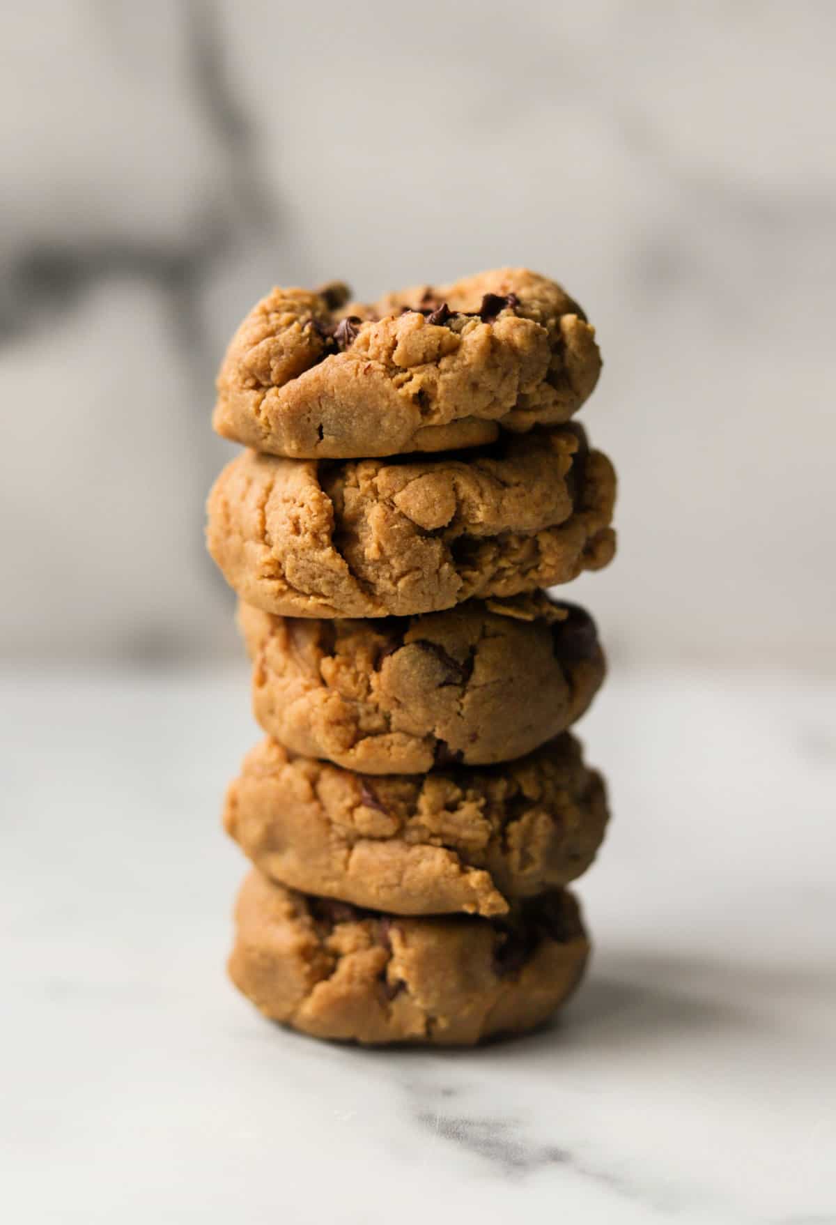 A front shot of a stack of peanut butter honey cookies.