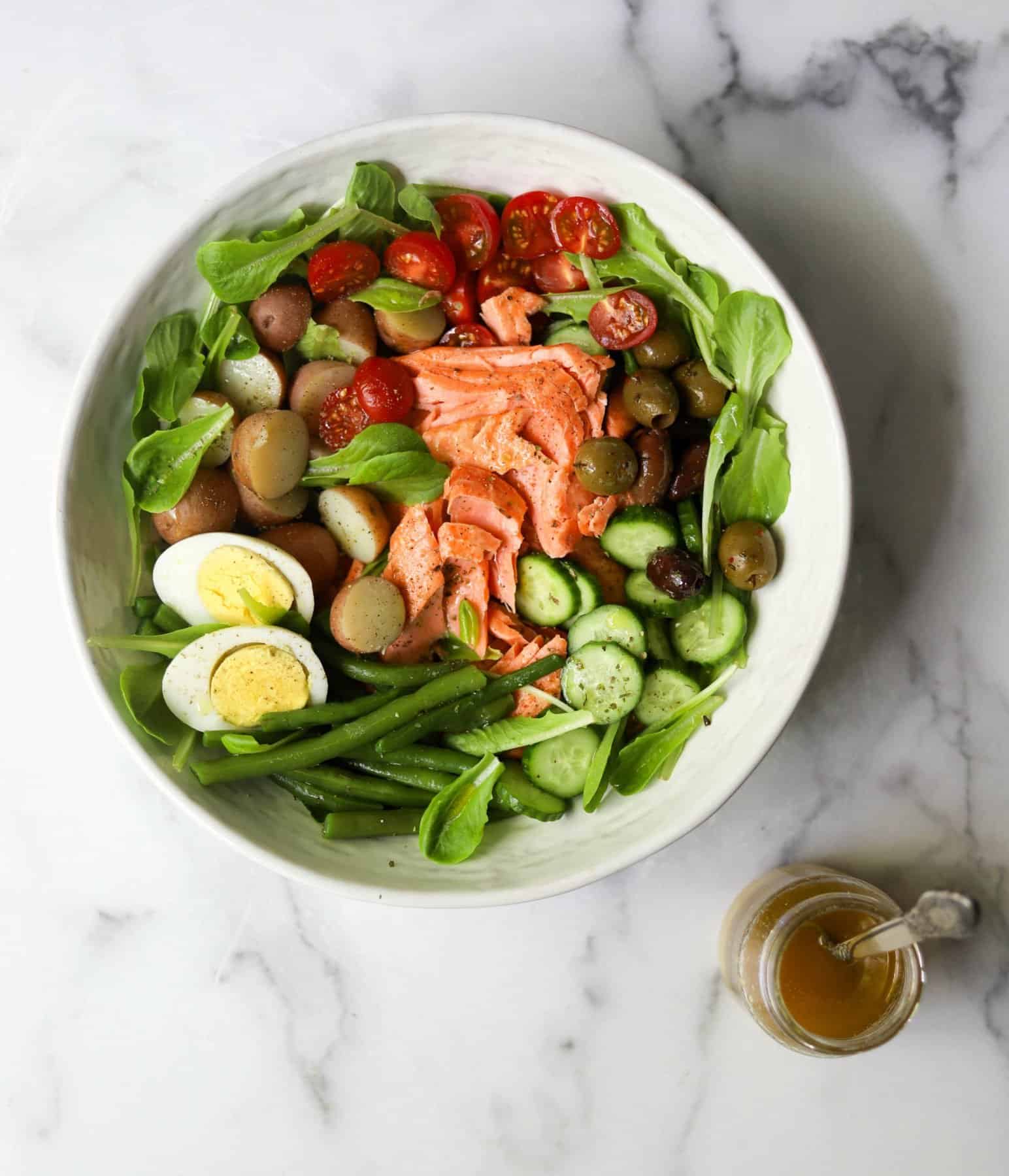 Pan-fried fish fillets with nicoise salad