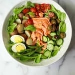 Salmon Nicoise Salad in a white bowl