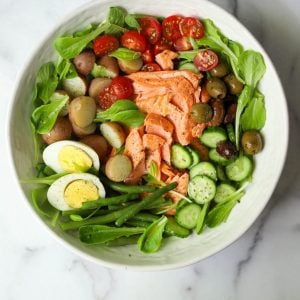 Salmon Nicoise Salad in a white bowl