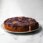 Blueberry upside down cake on a grey platter