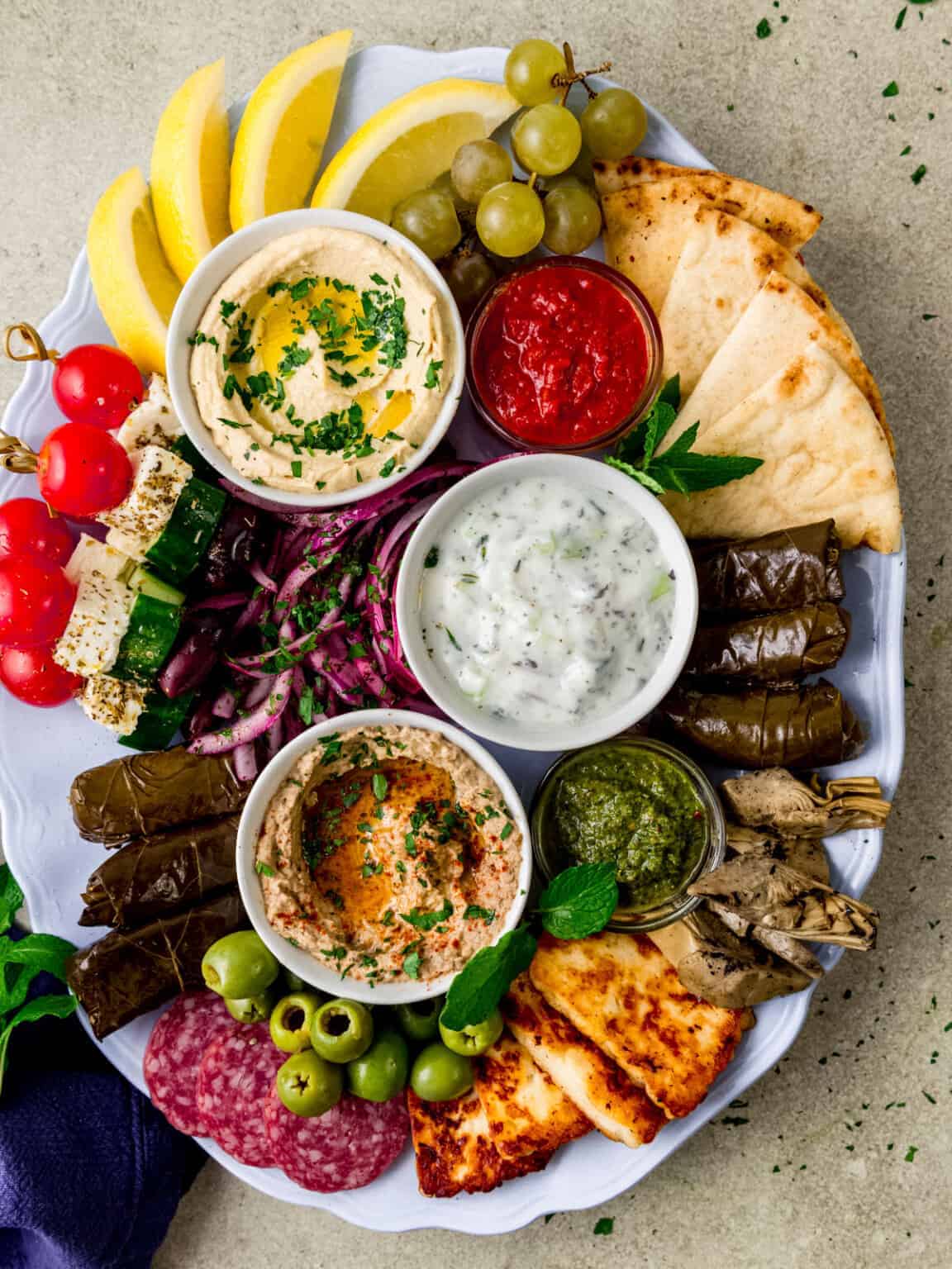 An overhead shot of a platter of Mediterranean charcuterie.