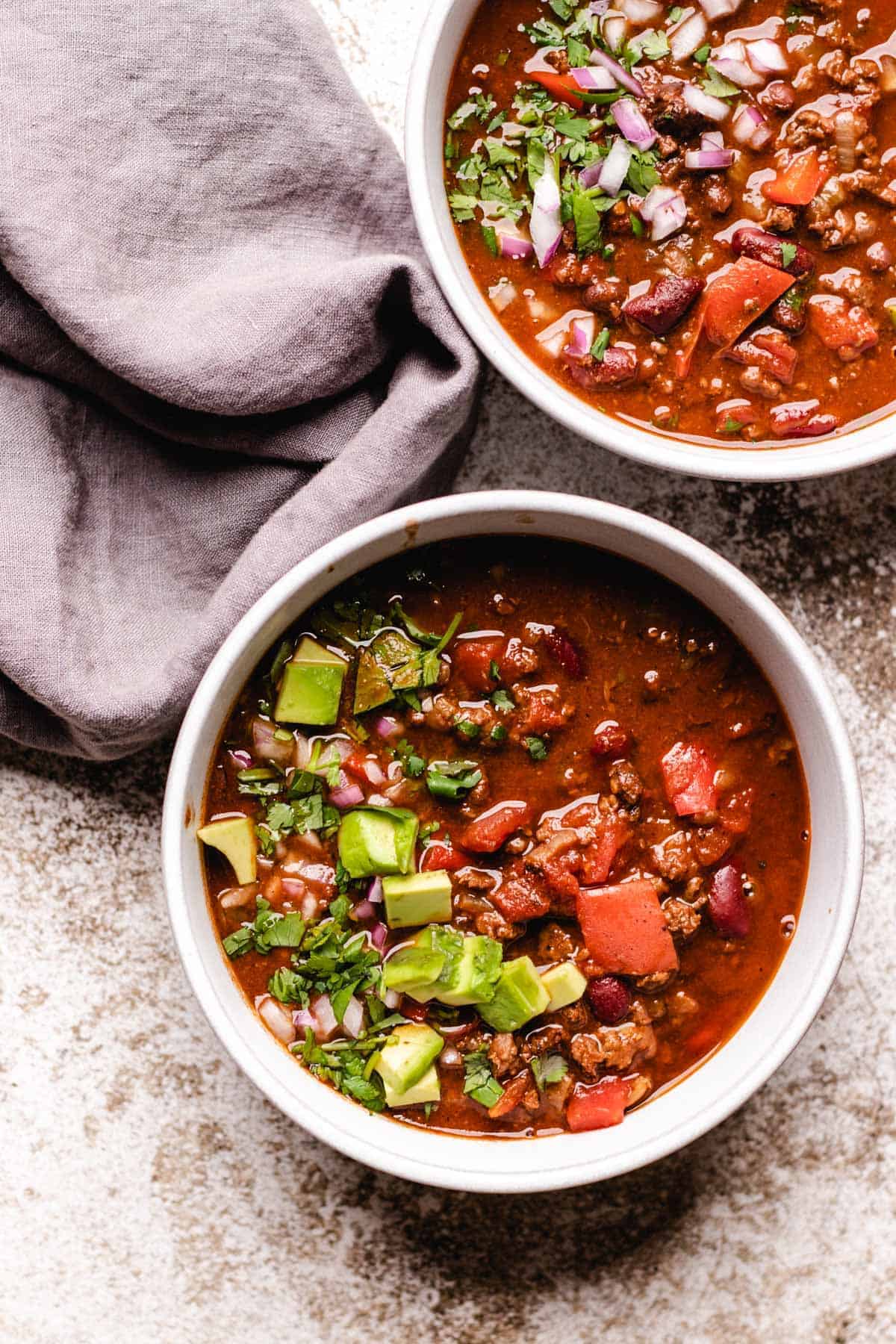 An overhead shot of bowls of venison chili.