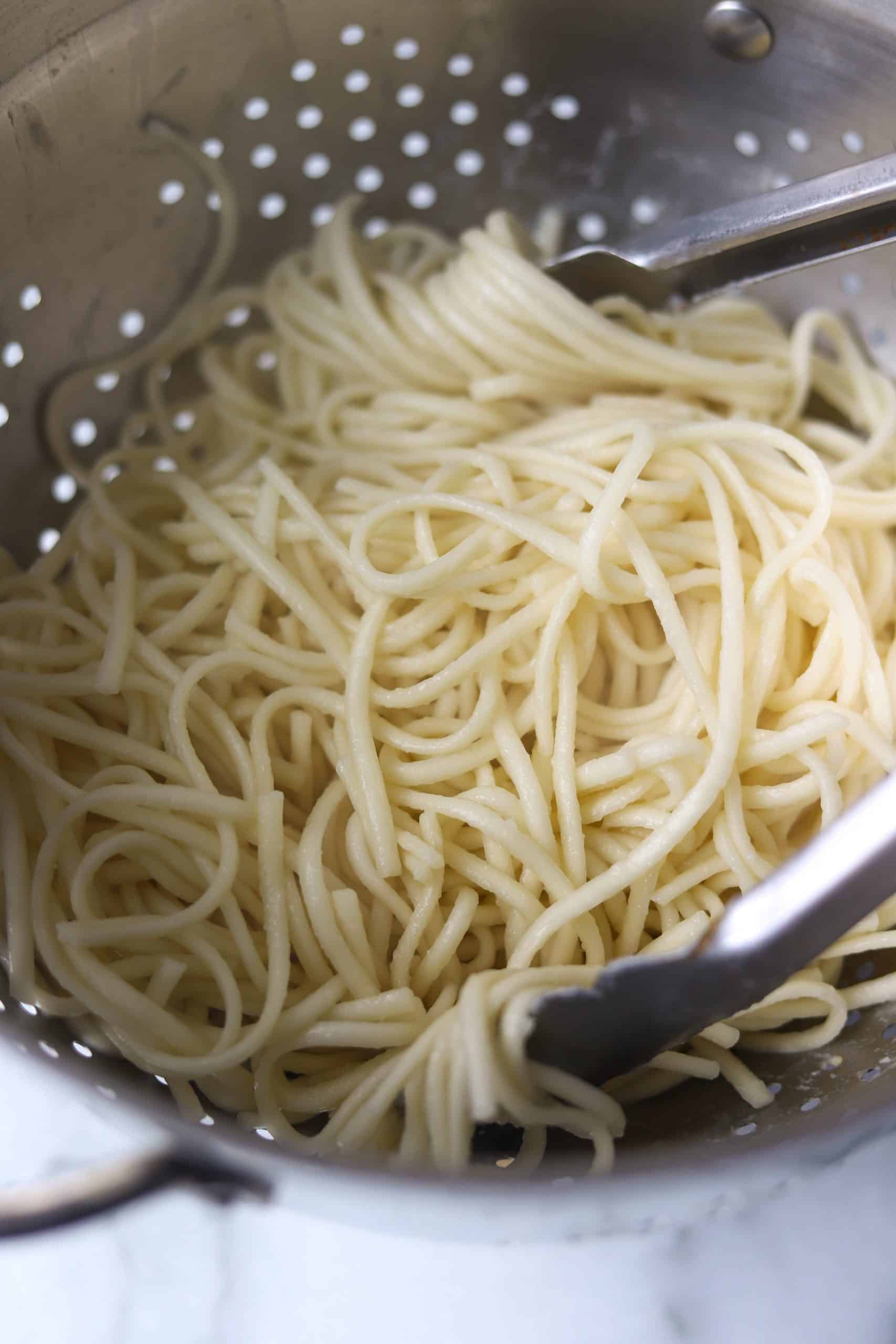 Spicy dan dan noodles in a white dish
