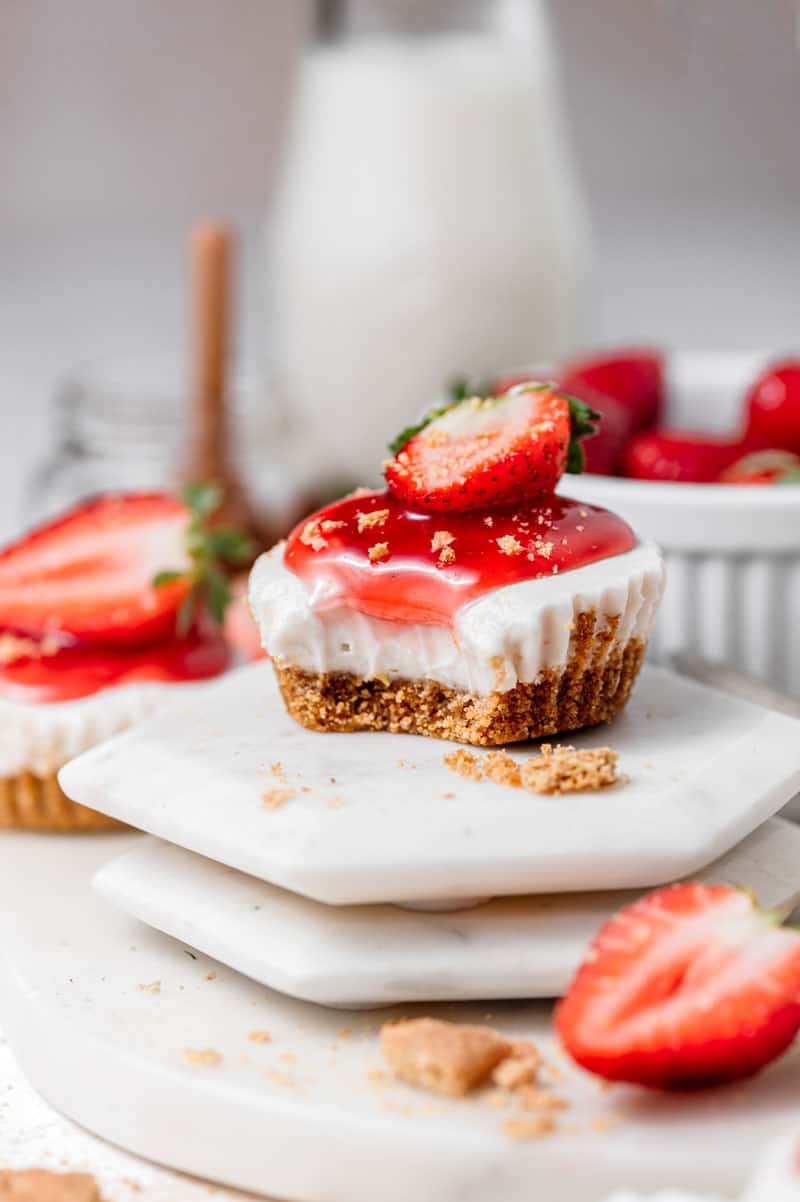 A front shot of vegan strawberry cheesecakes.