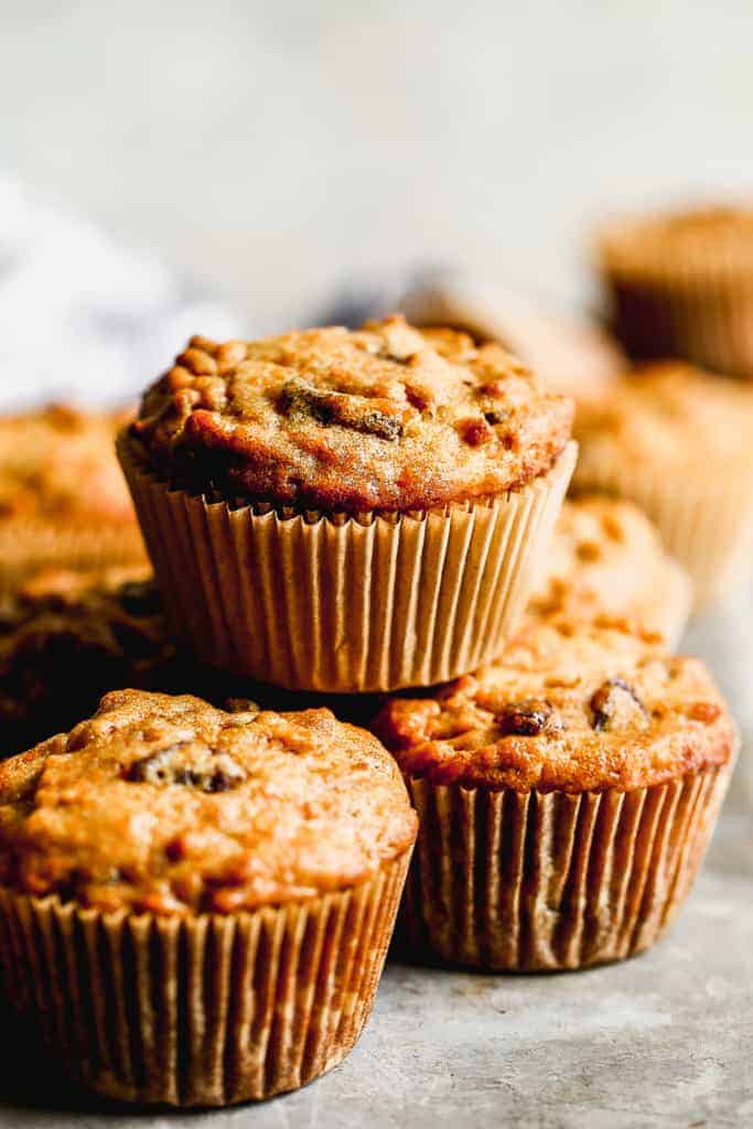 A side shot of stacked bran muffins.