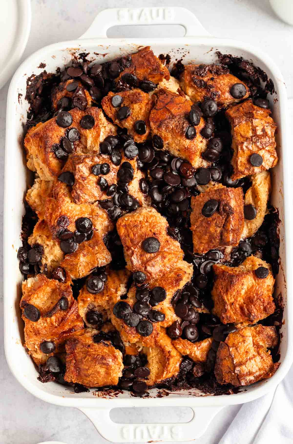An overhead shot of a pan of chocolate chip french toast casserole.