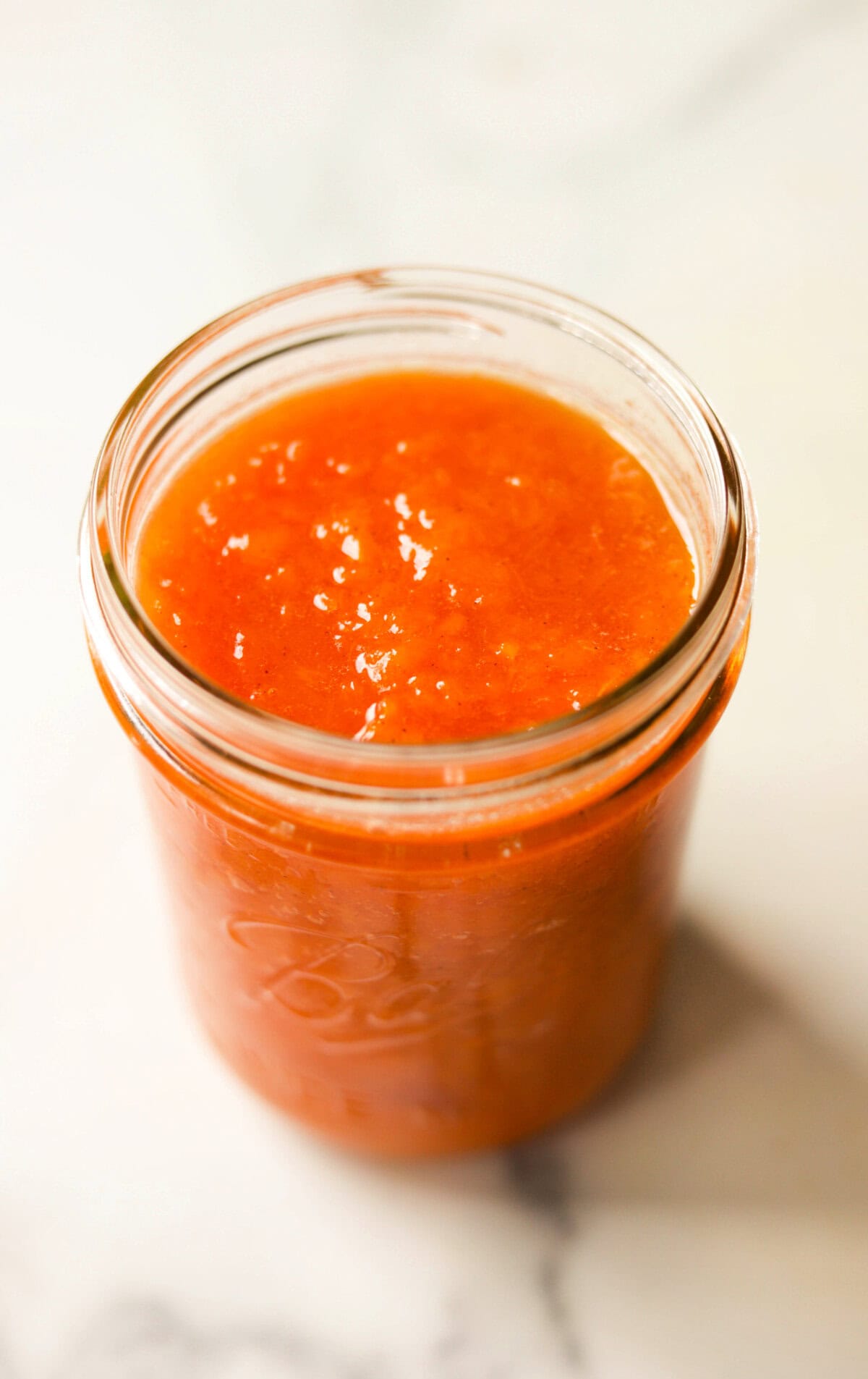 A jar of peach jam, no peel, no pectin.